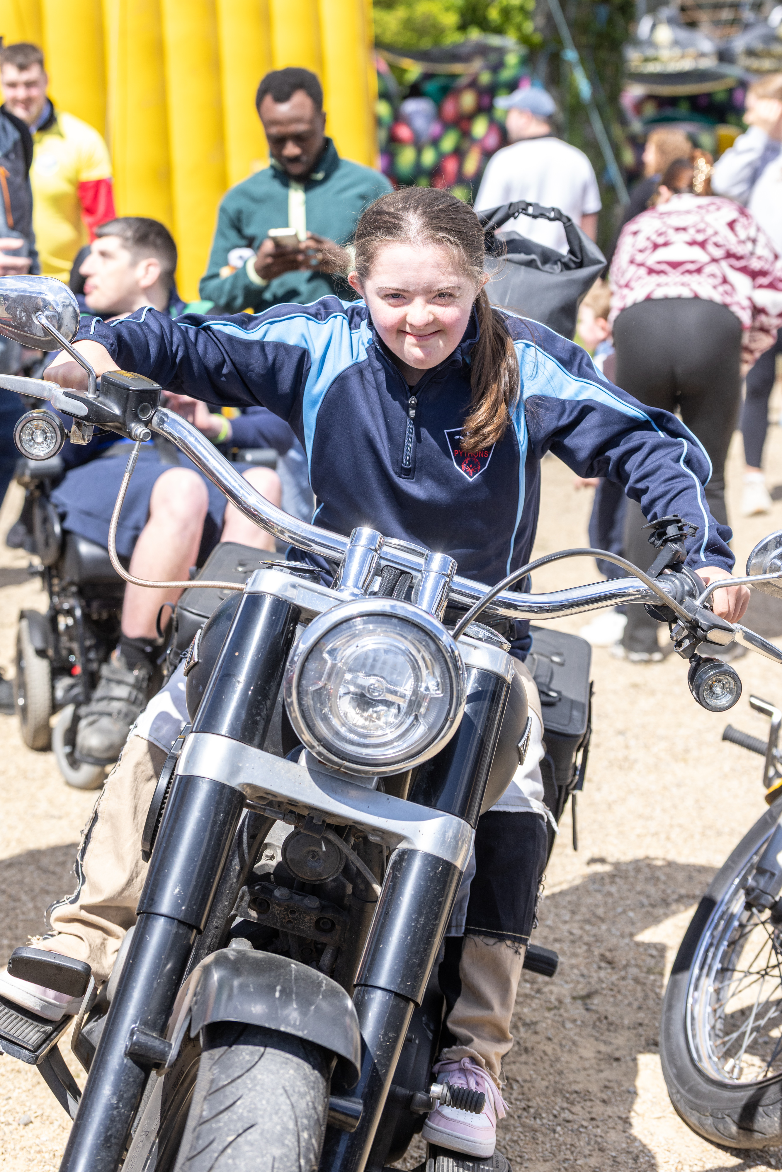 Child on  motorbike.